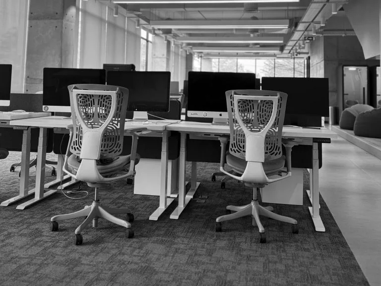 Modern office workstations with ergonomic seating